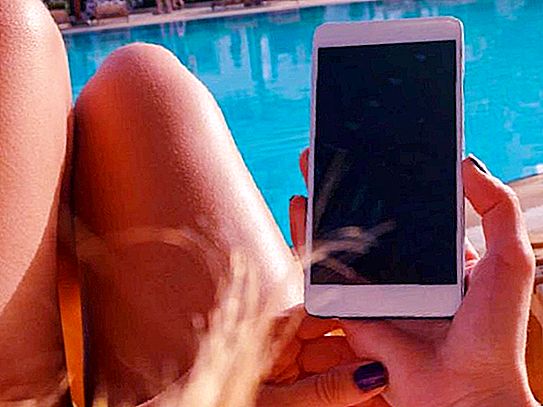 Obsession with social networks: a typical instagram mom brought a little daughter to the pool just for the sake of photos